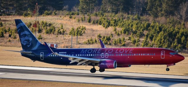 Boeing 737-900 (N493AS) - My first time seeing "More to Love" here at RDU!! Its even more gorgeous in person.  Tried to battle the backlit problems that winter casts on RDU during the afternoon hours (especially 5L/23R), but from whatever angle, its brilliant.  A gem of a 737! From the RDU parking deck, 12/28/17.