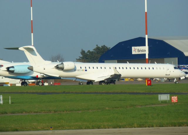 Canadair Regional Jet CRJ-900 (EI-GEC) - Parked outside KLM UK Engineering after respray from SAS c/s by Air Livery.
