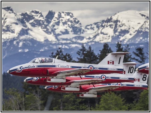 13-0335 — - May 6, 2021 Snowbirds lead, takes the first section up from Rwy 12 at CFB Comox during the annual Spring Training 