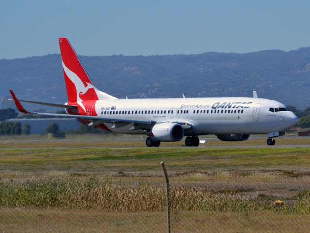 Boeing 737-800 (VH-VZB) - On taxi-way heading for take off on runway 05. Thursday 12th April 2012.