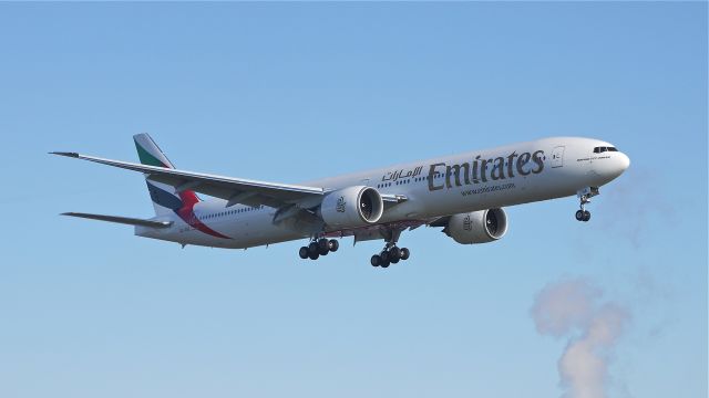 BOEING 777-300 (A6-ENE) - BOE205 on final approach to runway 16R to complete a flight test on 1/11/13. (LN:1069 c/n 35603).