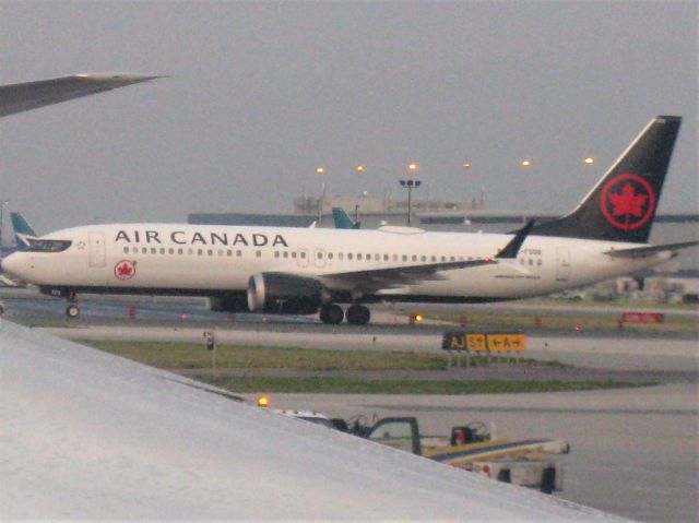 Boeing 737 MAX 8 (C-FSDB) - Early morning arrival taxiing out from Calgary Intl