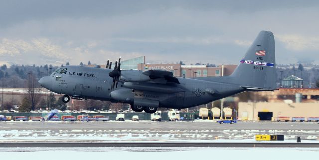 Lockheed C-130 Hercules (92-0549) - After being deiced (see previous photo in my folder), the Nevada Air Guard's "Roller Four Nine" departed.  The heavy fog was gradually burning off by the time "Roller Four Nine" took off from 16R.