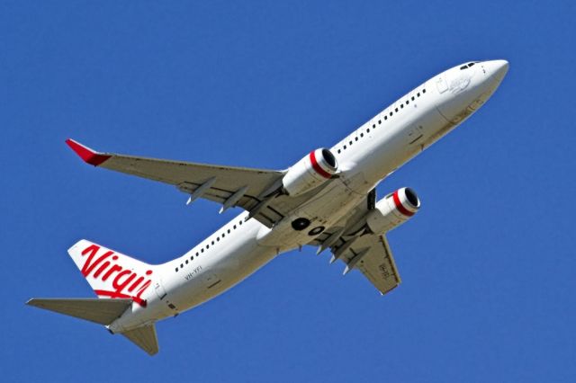 Boeing 737-800 (VH-YFI) - Getting airborne off runway 23 and heading off to an interstate destination on the last day of the Australian summer. Thursday 28th February 2013.