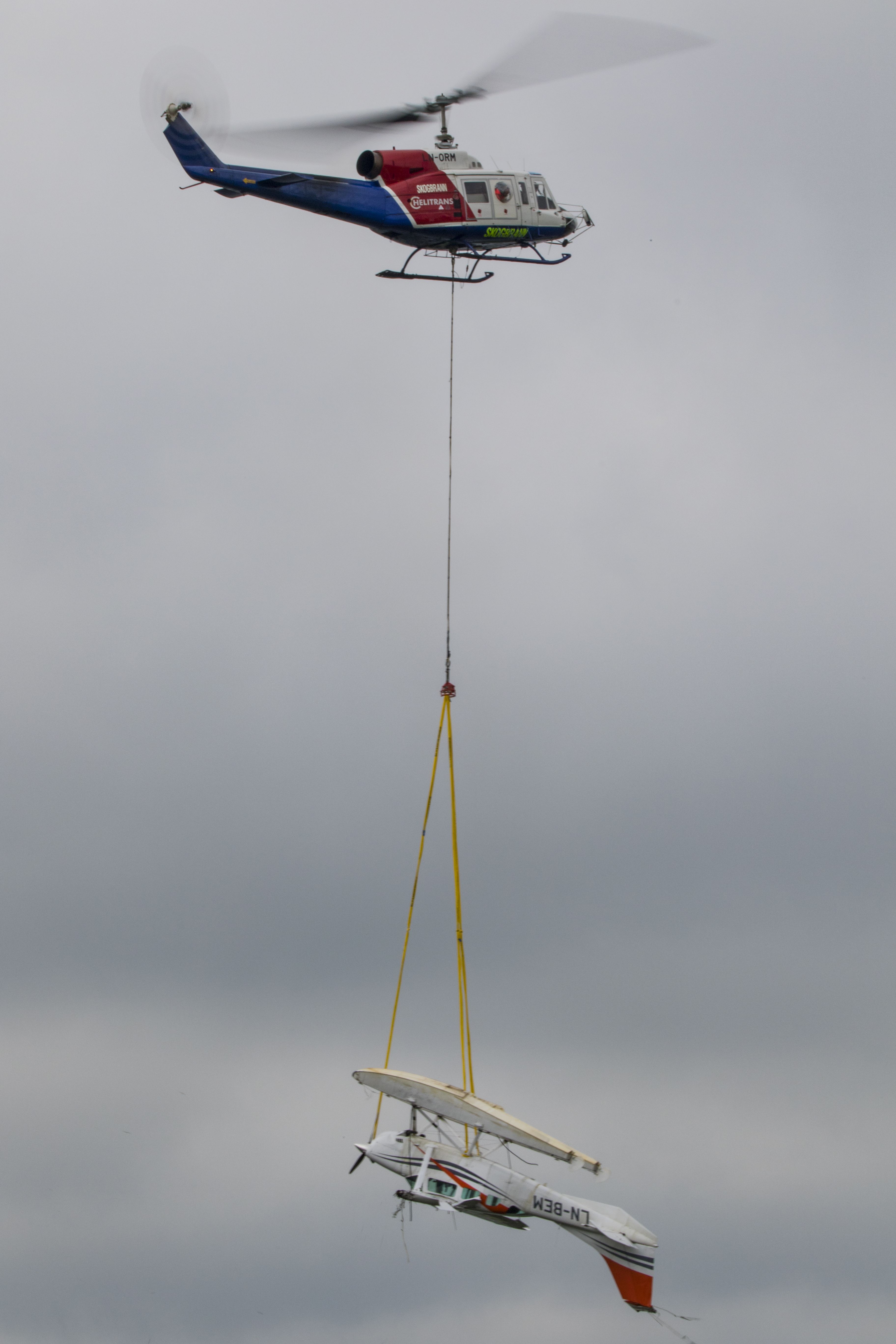 Bell BigLifter (LN-ORM) - Bell 214 lifting out a crashed Cessna pontoon plane just outside my doorstep here in the small city of Bryne in Norway