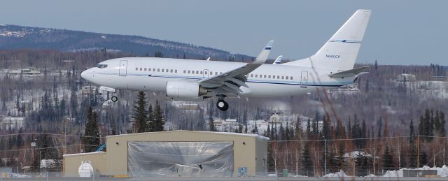 — — - Continetal Oil Company 7377 just about down. In the background we have a new Medivac Hangar taking shape.