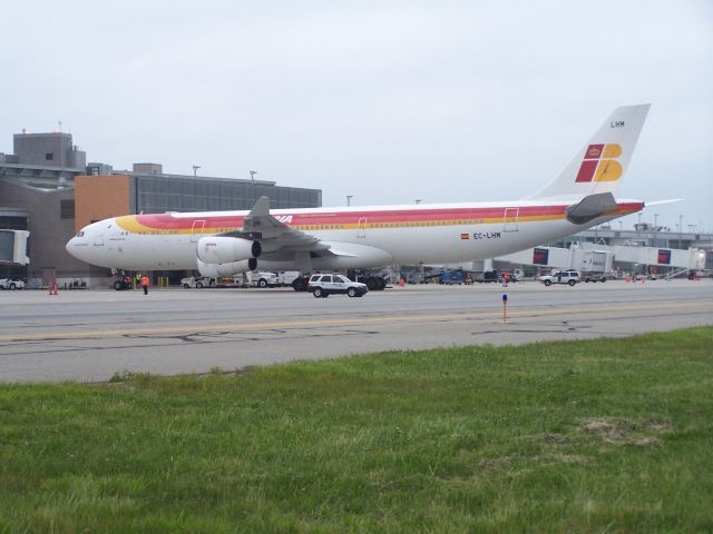 Airbus A340-300 (EC-LMH) - EC-LMH the first A340 to visit Providence on June 1st. LMH had flown the Spanish football team in for a game against the US team at Foxboro in Mass