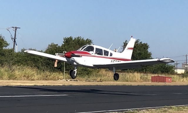 Piper Cherokee (N55722) - Near the runway watching my sons first solo.