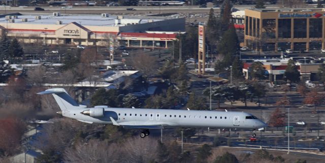 Canadair Regional Jet CRJ-900 (N938LR) - On short final for 34L as it is arriving from Sky Harbor in Phoenix (KPHX).