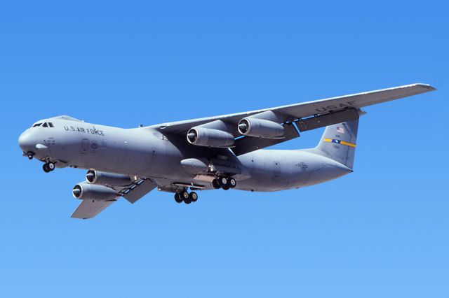 Lockheed C-141 Starlifter (67-0014) - March 1997 - C-141 (70014) on final for 21L at Nellis AFB.