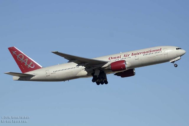 Boeing 777-200 (N927AX) - Omni Air International Boeing 777-222 N927AX departing from Sky Harobor with a West Virginia Mountaineers football charter bound for Pittsburgh International Airport on January 3, 2016. It first flew on August 15, 1997. Its construction number is 26943. It was delivered to United as N709UA on August 28, 1997. Air India registered it as VY-AIJ on February 17, 2005. Omni Air International registered it as N927AX on May 20, 2011. 