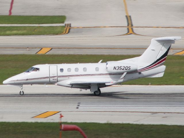 Embraer Phenom 300 (N352QS) - Little after the beginning of takeoff roll