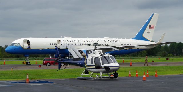 Boeing 757-200 (N614TC) - MORRISTOWN, NEW JERSEY, USA-AUGUST 19, 2018: Seen on the tarmac at Morristown Municipal Airport, in front of Air Force One (a Boeing 757-200 is used at Morristown because of short runways), was a Eurocopter AS-350 AStar, registration number N614TC.