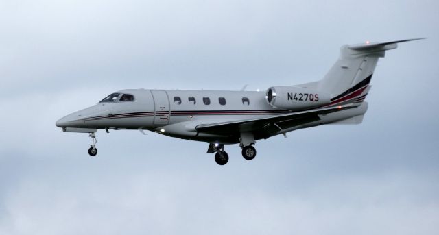 Embraer Phenom 300 (N427QS) - On final is this 2018 Embraer Phenom EMB-505 in the Spring of 2019.