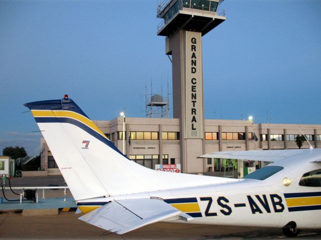 Cessna Centurion (ZS-AVB) - At Grand Central airport, South Africa.