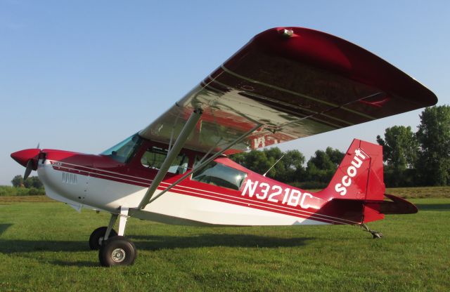 — — - American Champion 8GCBC Scout, taken at the Forest Lake Minnesota airport fly-in pancake breakfast. 