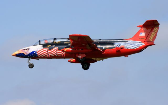 Aero L-29 Delfin (N129DH) - L-29 Delfin with an amazing patriotic theme on final for M54 (Lebanon, TN). Words under the horizontal stab say, "Die for something or live for nothing."