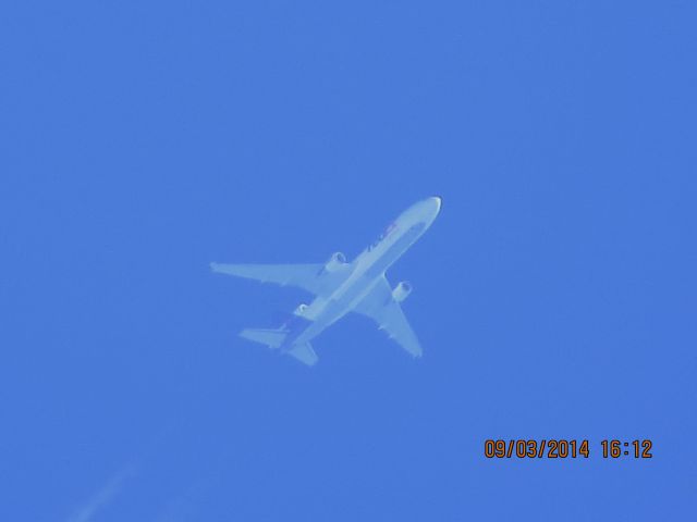 Boeing MD-11 (N620FE) - FedEx flight 781 from MEM to PDX over Baxter Springs KS (78KS) at 38k feet.