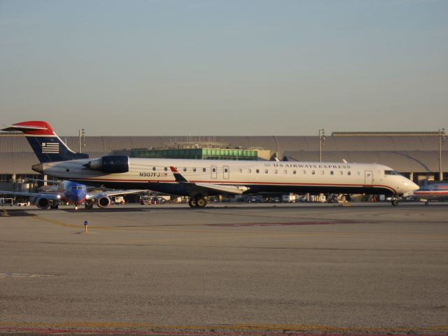 Canadair Regional Jet CRJ-900 (N907FJ) - Holding on RWY 19R