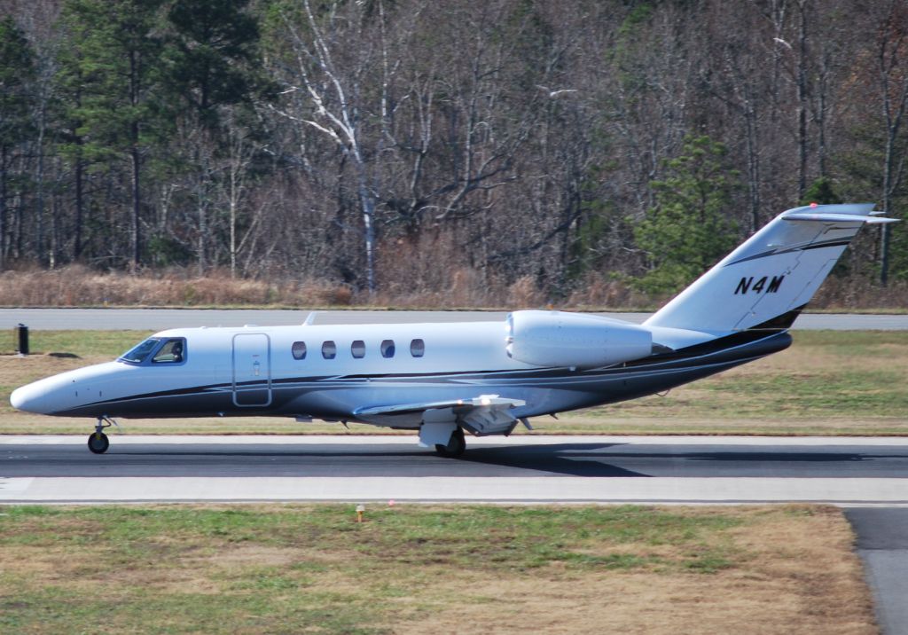 Cessna Citation CJ4 (N4M) - MME-CJ4 LLC (NASCAR driver Mark Martin) arriving on runway 20 at KJQF - 12/2/10