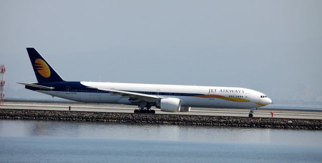 Boeing 777-200 (A6-JAF) - Taxiing for take off from 28L  08-23-2015