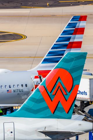 Airbus A319 (N838AW) - An American Airlines A319 in America West retro livery parked at PHX on 2/16/23. Taken with a Canon R7 and Tamron 70-200 G2 lens.