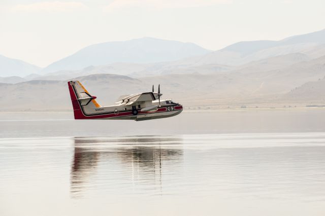 Canadair CL-415 SuperScooper (N385AC) - CL-215-6B11 (CL-415) operating from Clark Canyon Reservoir near Dillon Montana on the Bear Creek Fire