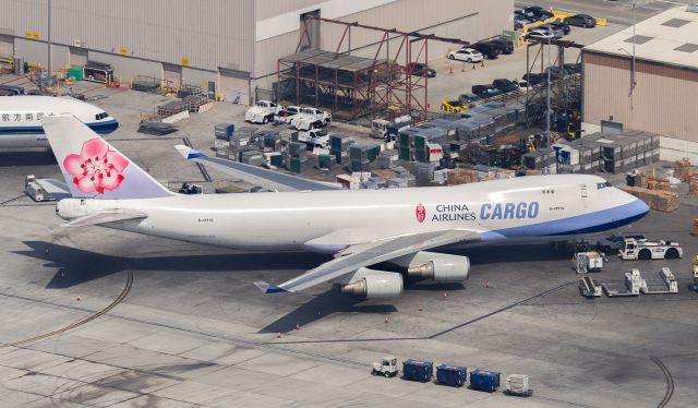 Boeing 747-400 (B-18716) - Arriving as CAL5108, waiting for her next mission to Taiwan on the LAX cargo ramp