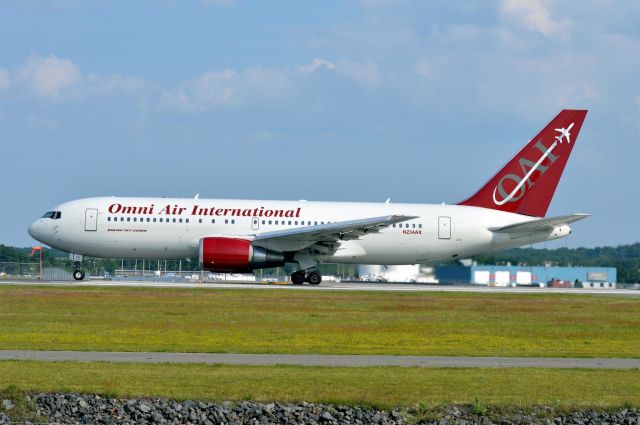 BOEING 767-200 (N234AX) - Omni 820 Heavy Rolling down 06