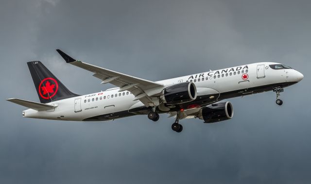 OSKBES-MAI Kityonok (C-GJXV) - One of Air Canada's newest fleet members arrives under moody skies, heralding the retirement of several other types in the AC fleet including E190's and 767's