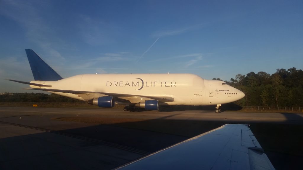 — — - While taxiing to the runway this beauty was taxiing to the gate in South Carolina.