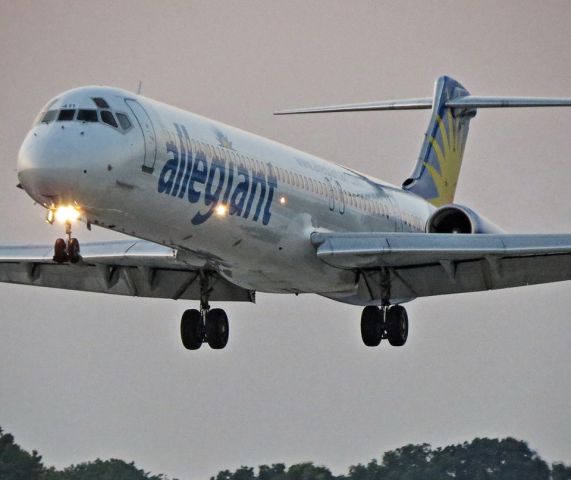 McDonnell Douglas MD-80 (N883GA) - Over the numbers at sunset