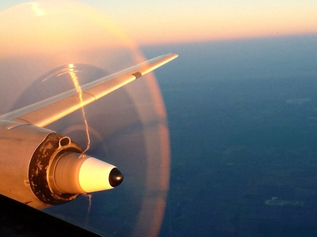 CONVAIR CV-580 (XA-UMI) - Heading back to Laredo from Dayton.br /A beautiful evening over Houston Area.