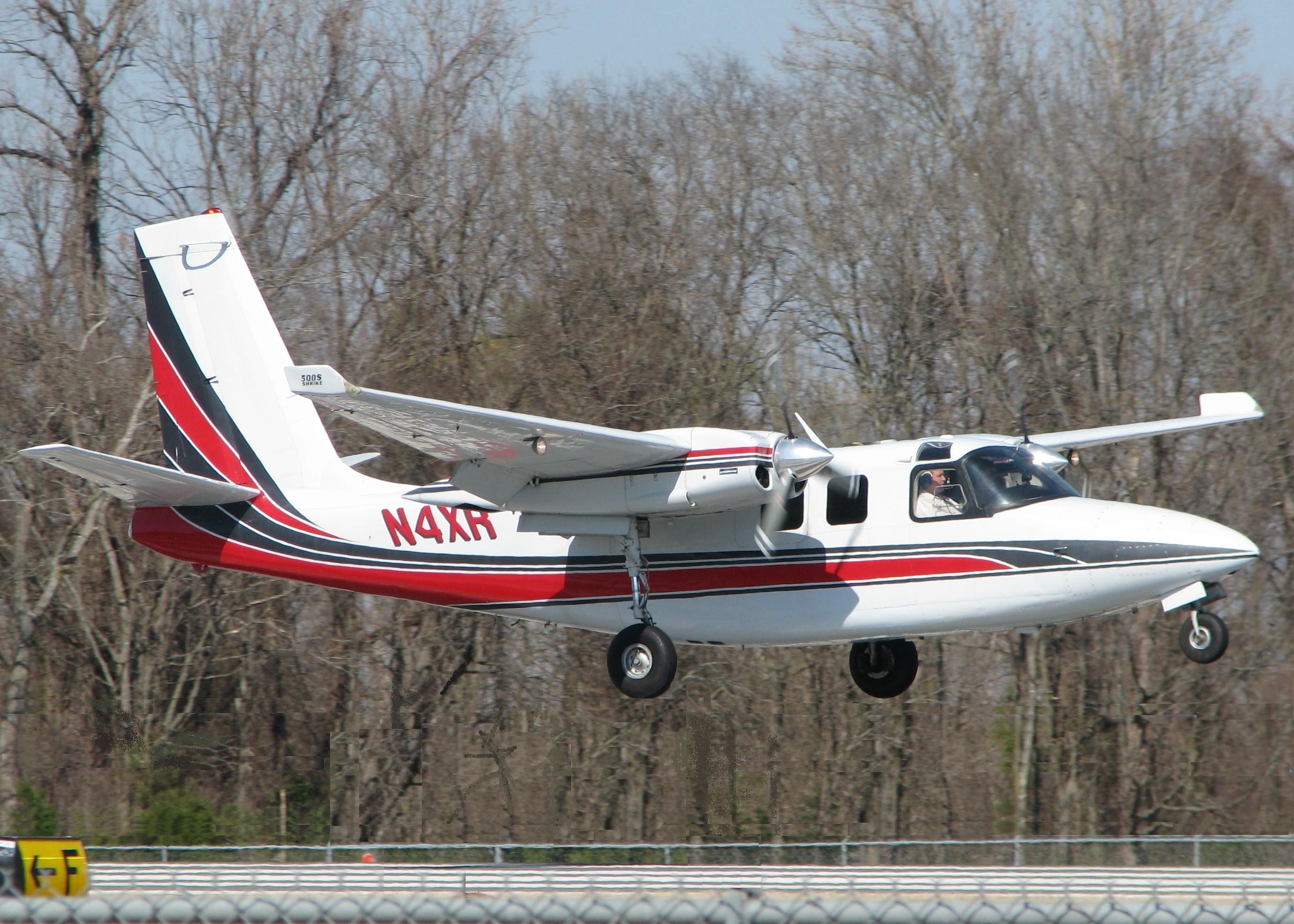 Aero Commander 500 (N4XR) - Landing on runway 14 at the Downtown Shreveport airport.