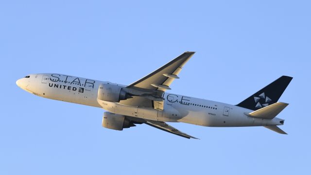 Boeing 777-200 (N76021) - Departing LAX on 25R