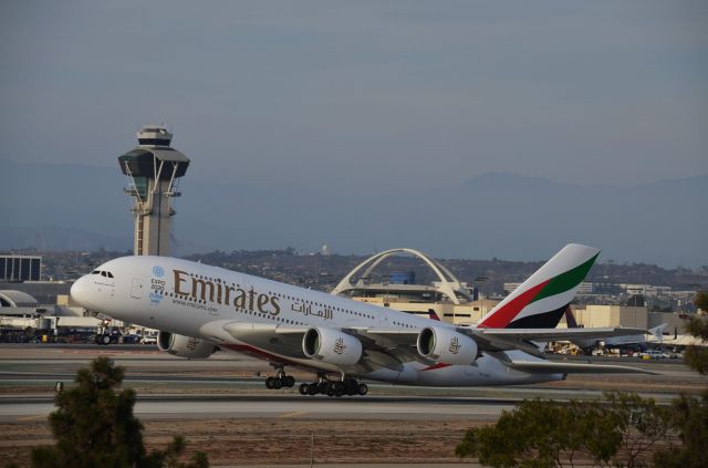 Airbus A380-800 (A6-EEQ) - A rare departure of an A380 on Runway 26L at LAX as seen from Imperial Hill.