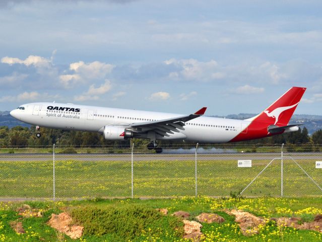 Airbus A330-300 (VH-QPJ) - About to put down on runway 05. Thursday 12th July 2012.