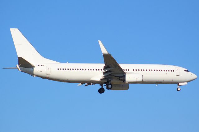 Boeing 737-800 (OM-MEX) - An AirExplor B737-800 landing at Frankfurt Airport.br /br /Location: Viewpoint "West Runway"/Aussichtspunkt "Startbahn West".br /Date: 13.02.23 (dd/mm/yy