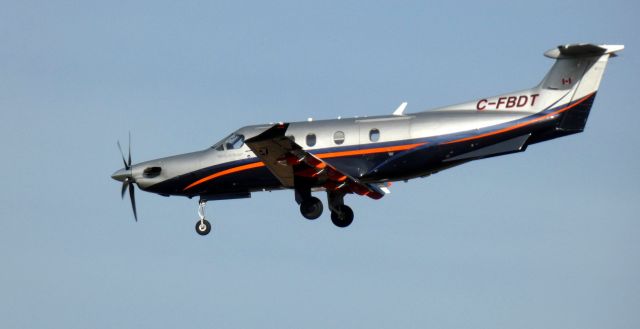 Pilatus PC-12 (C-FBDT) - On final is this 2018 Pilatus PC-12NG in the Autumn of 2021. CYUL-KPBG-KPNE